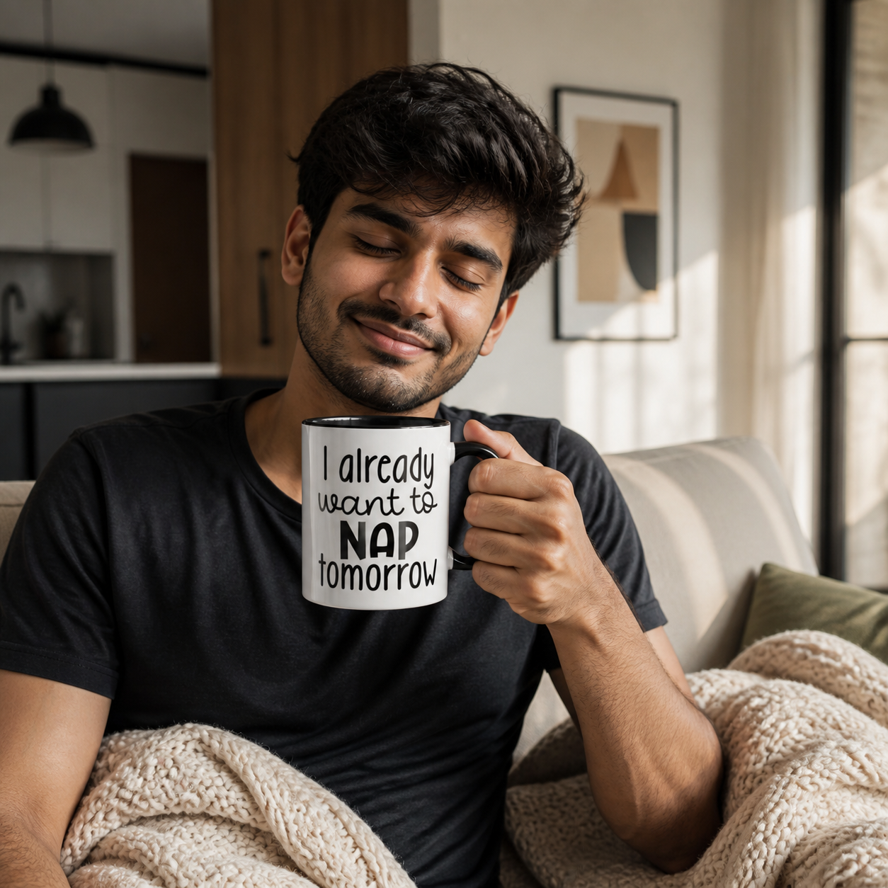 Young man holding black-accent I Already Want to Nap Tomorrow mug