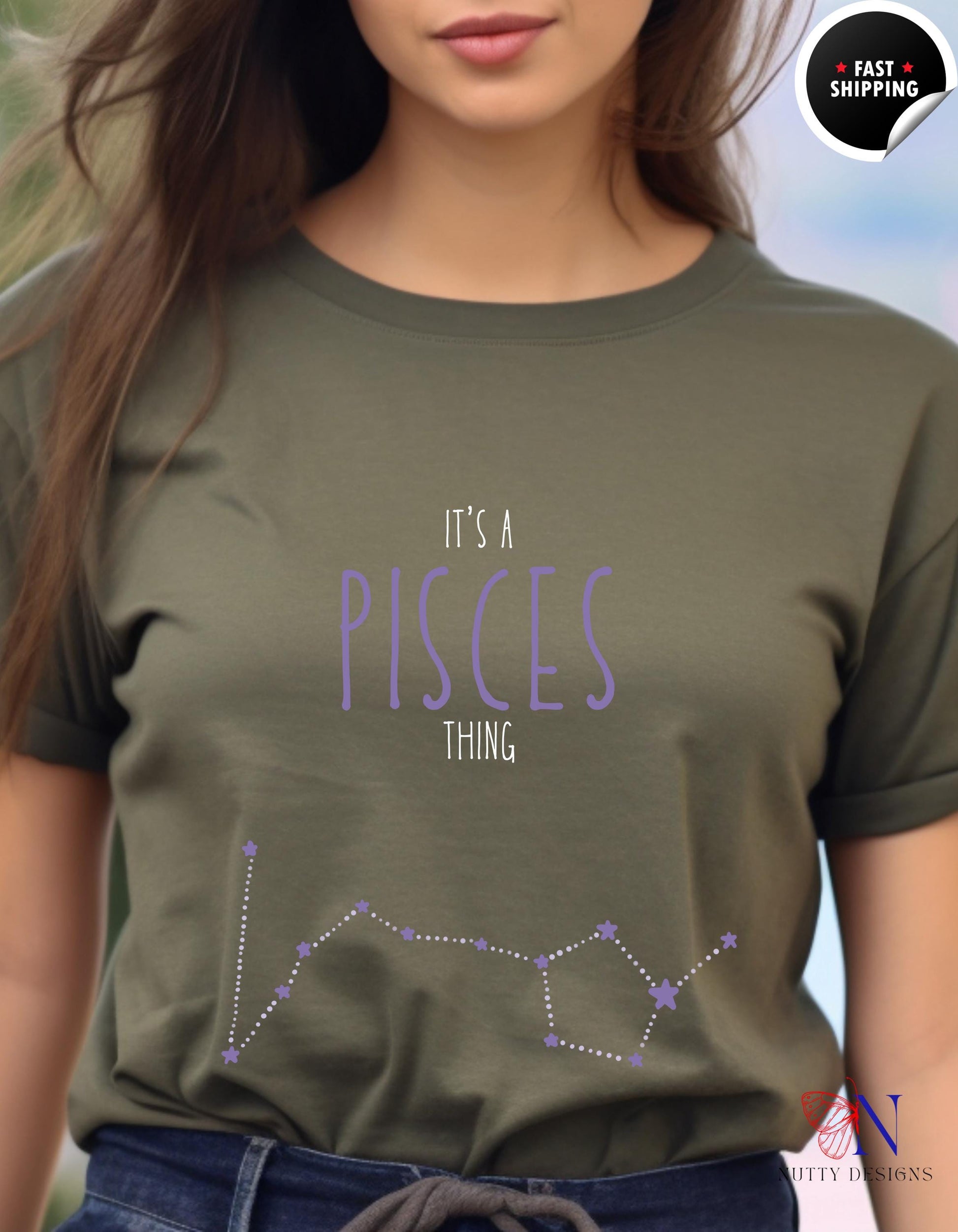 a woman wearing a t - shirt that says it&#39;s a pisces