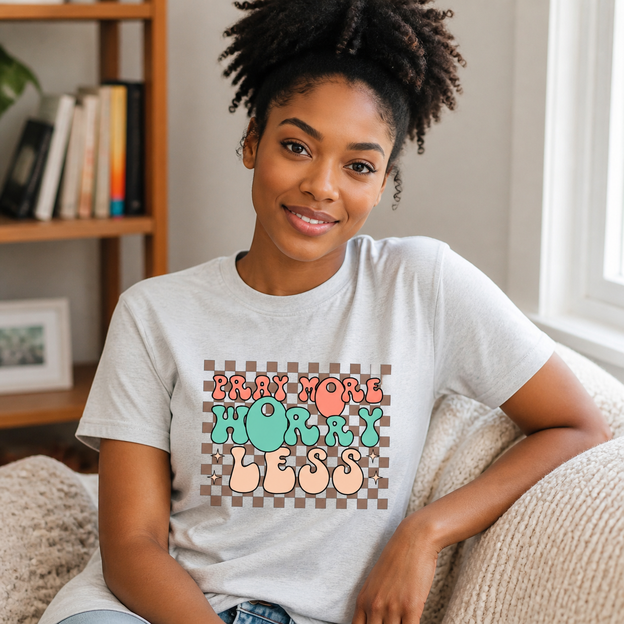 Young woman wearing gray Pray More Worry Less faith graphic T-shirt