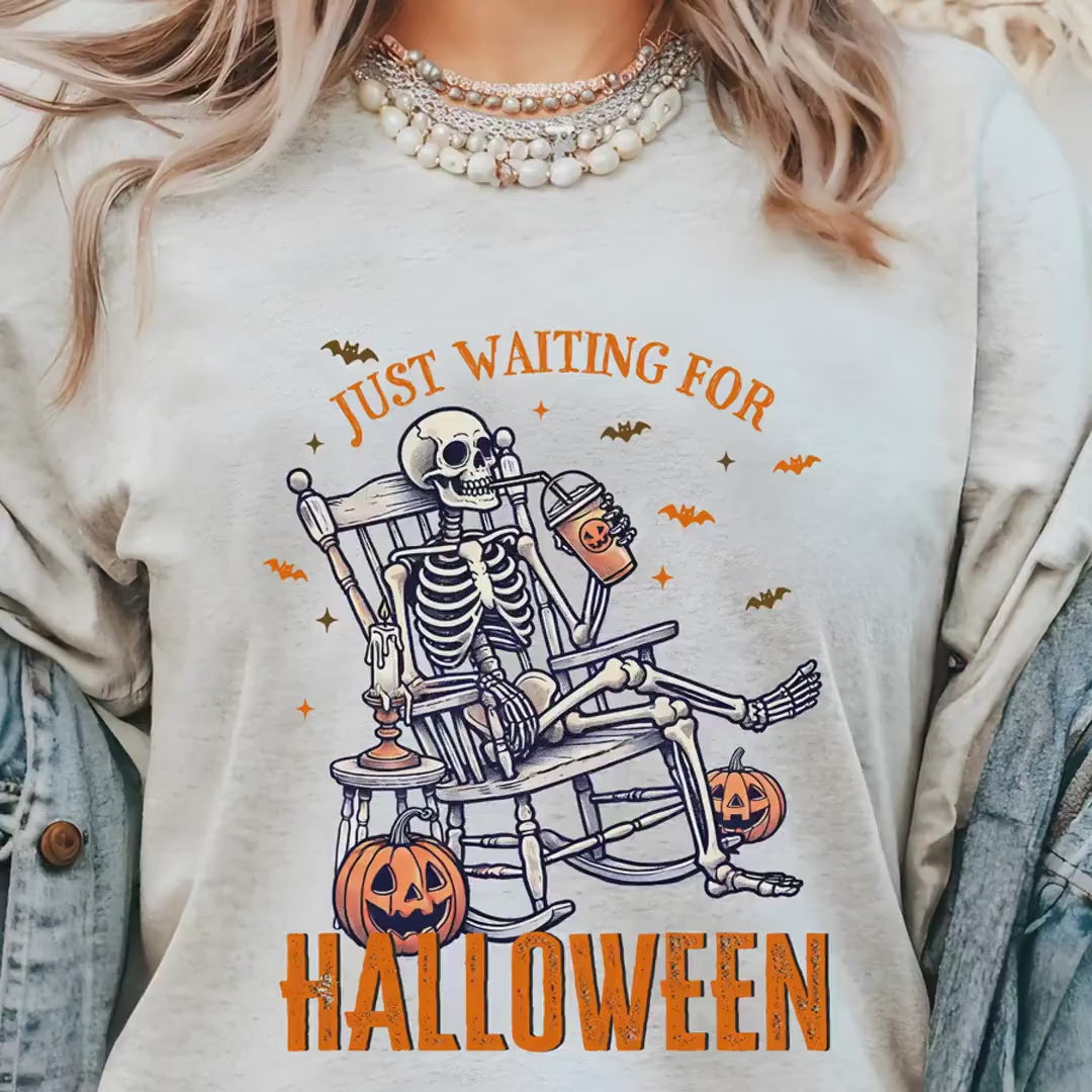 Load video: Just Waiting For Halloween Skeleton T-shirt | Spooky Graphic Tee | Halloween Costume Top | Fall Celebration Wear