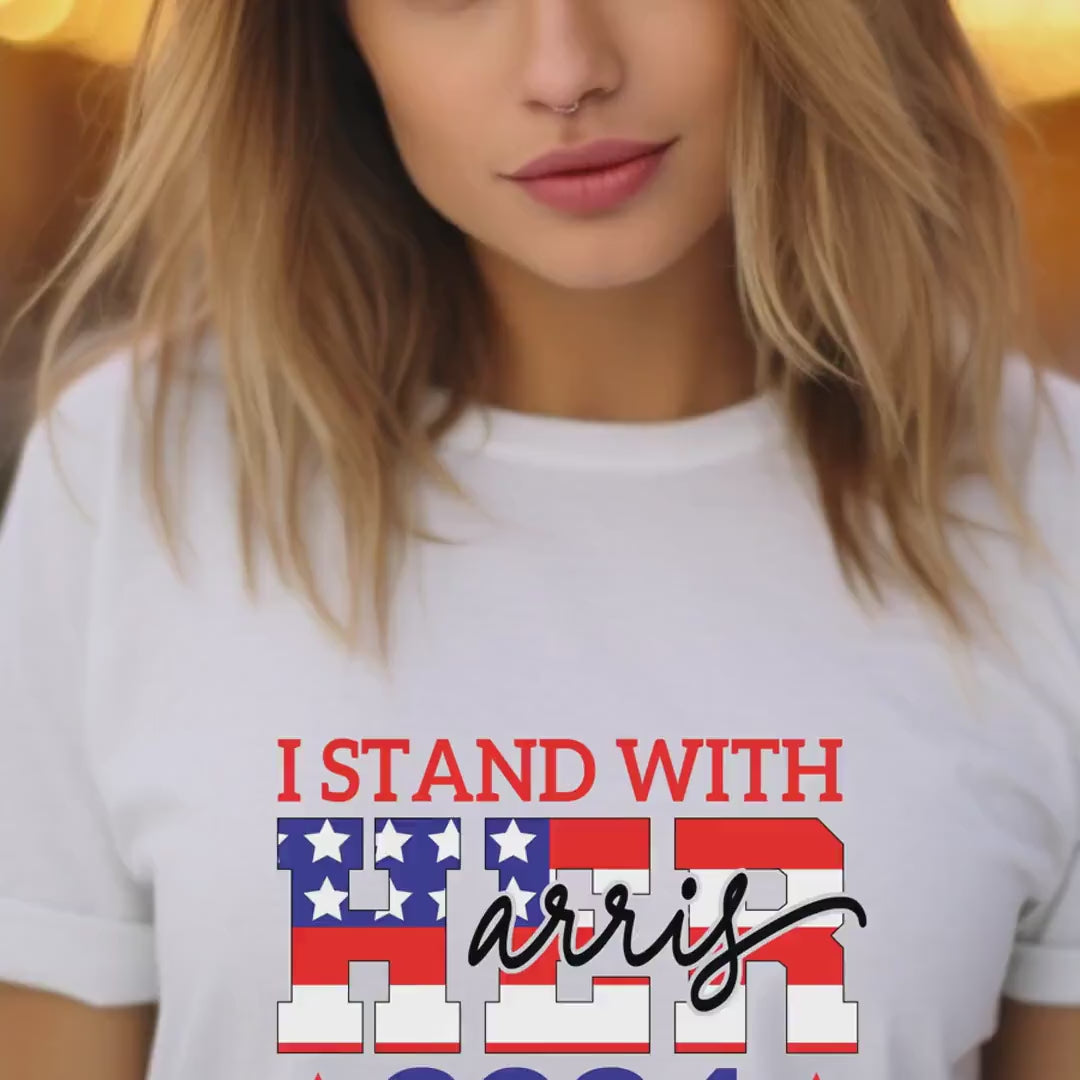 Load video: I Stand With Her T-Shirt | Kamala Harris 2024 Campaign Tee | Feminist Apparel &amp; Political Statement Shirt