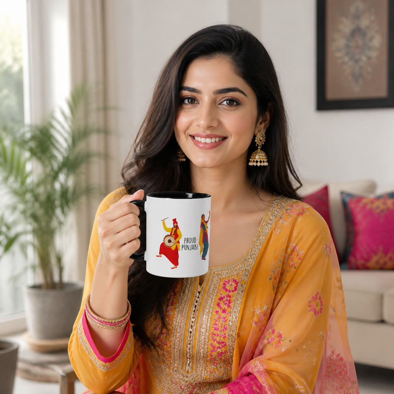 Young Punjabi woman holding black-accent Proud Punjabi mug