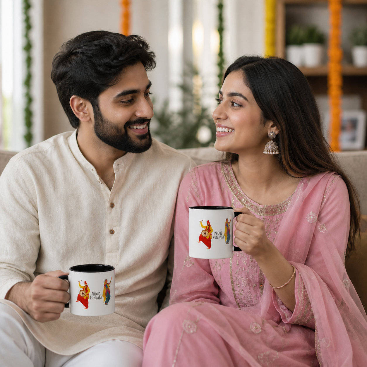 Young Punjabi couple holding matching black-accent Proud Punjabi mugs
