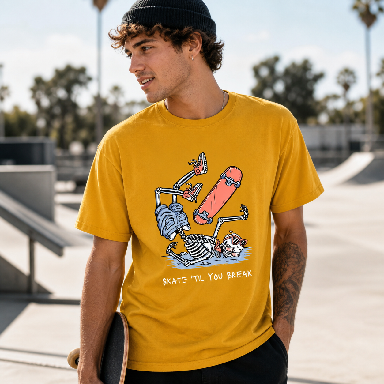 Young skateboarder wearing Skate Till You Break skeleton graphic T-shirt