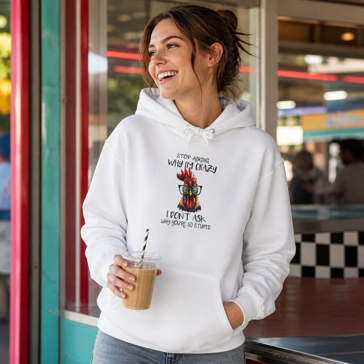 Man wearing funny crazy rooster graphic hoodie in a relaxed lifestyle setting