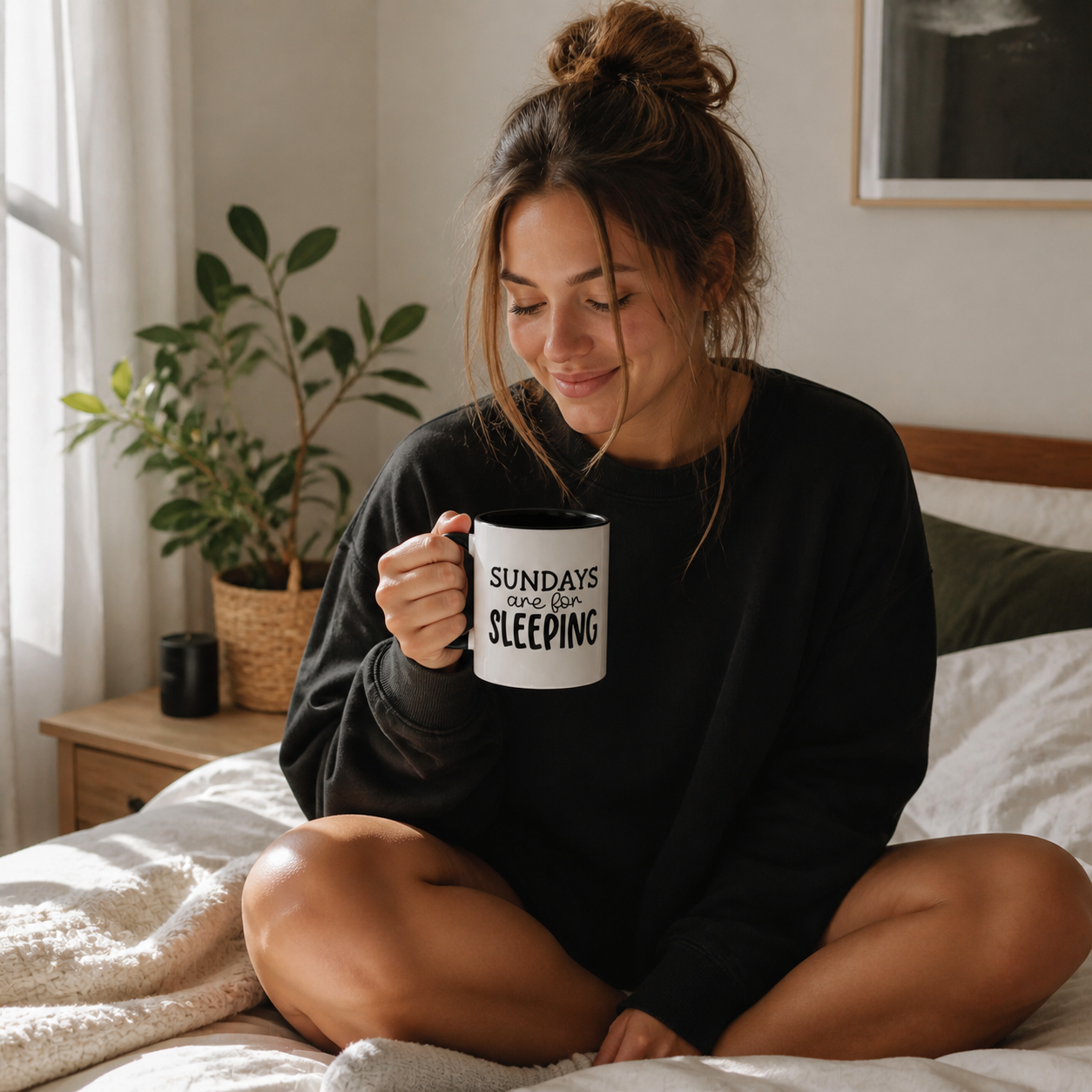 Woman holding black accent Sundays Are for Sleeping coffee mug on a sunlit Sunday morning