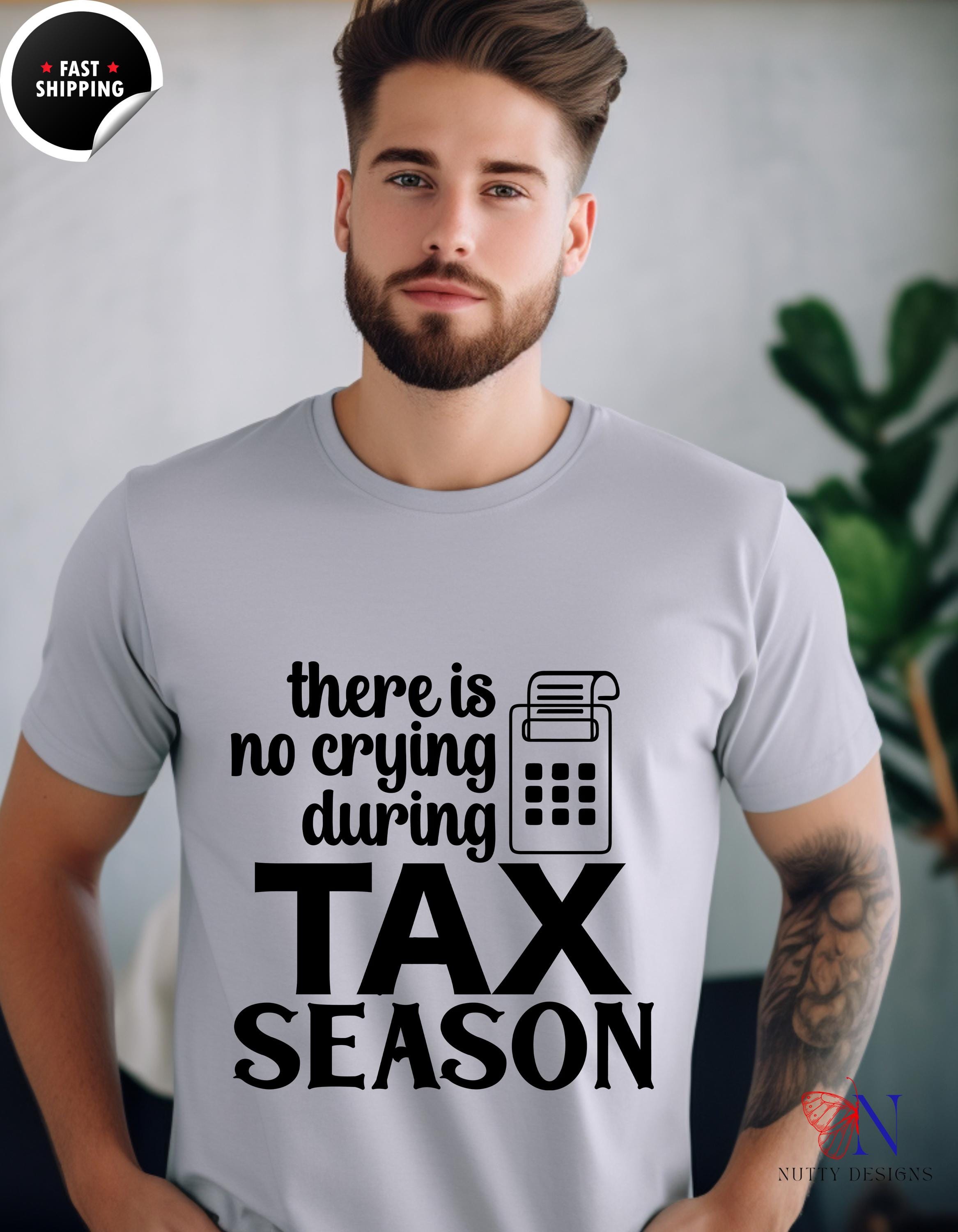 a man wearing a t - shirt that says there is no crying during tax season