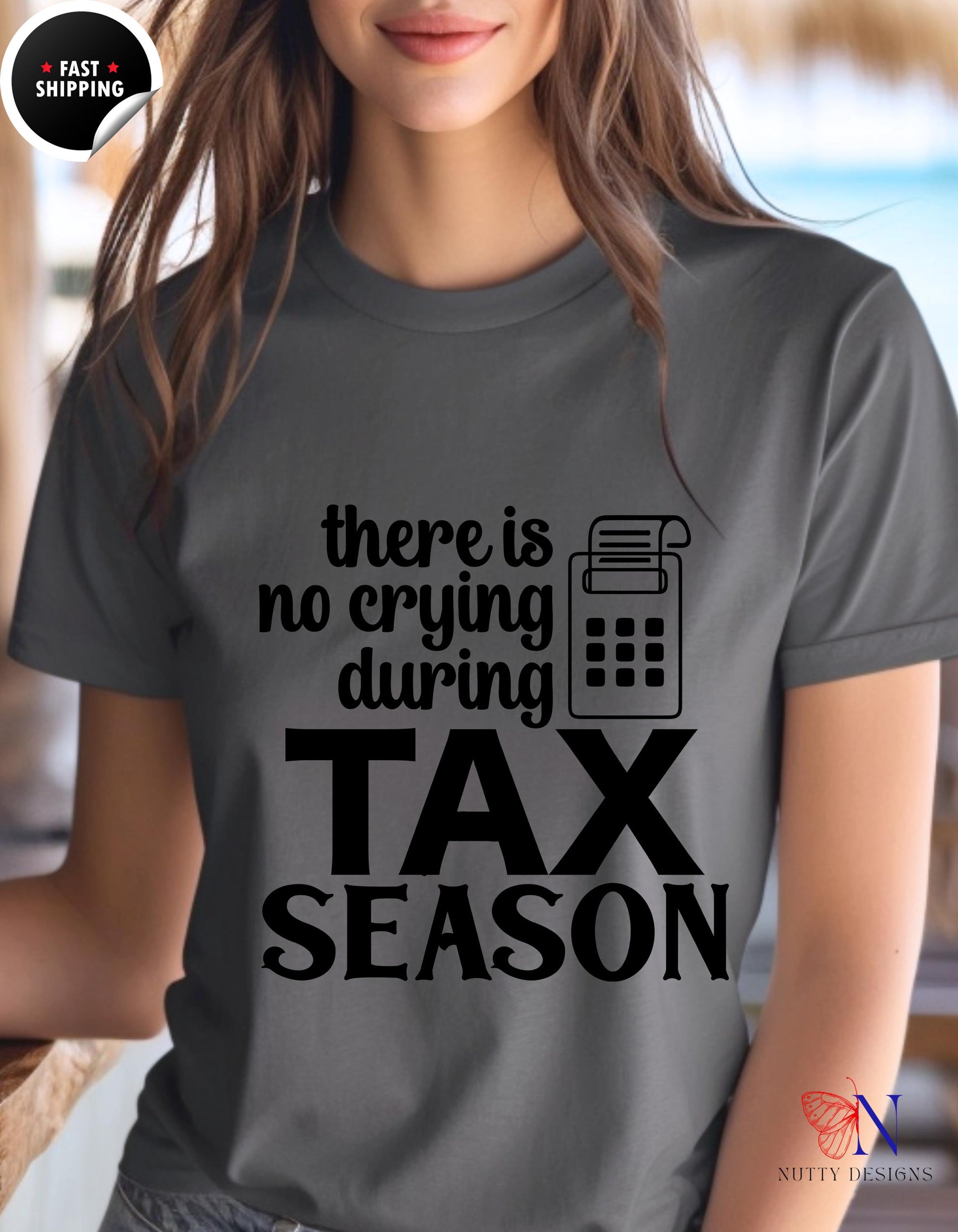 a woman wearing a t - shirt that says there is no crying during tax season