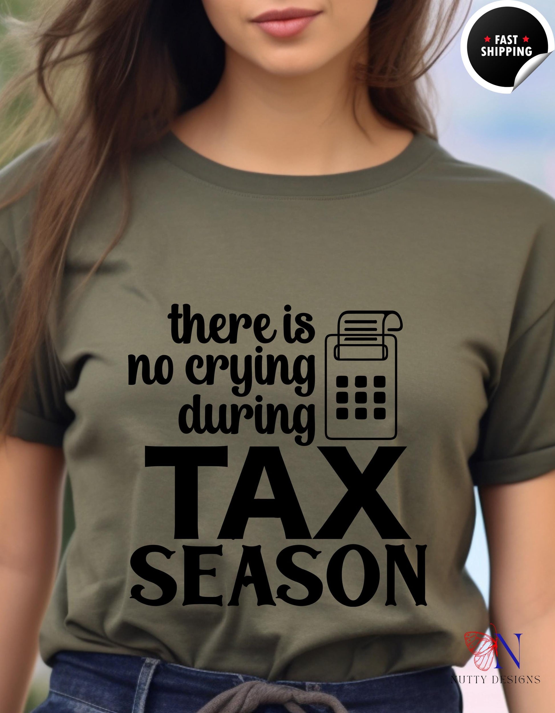 a woman wearing a t - shirt that says there is no crying during tax season