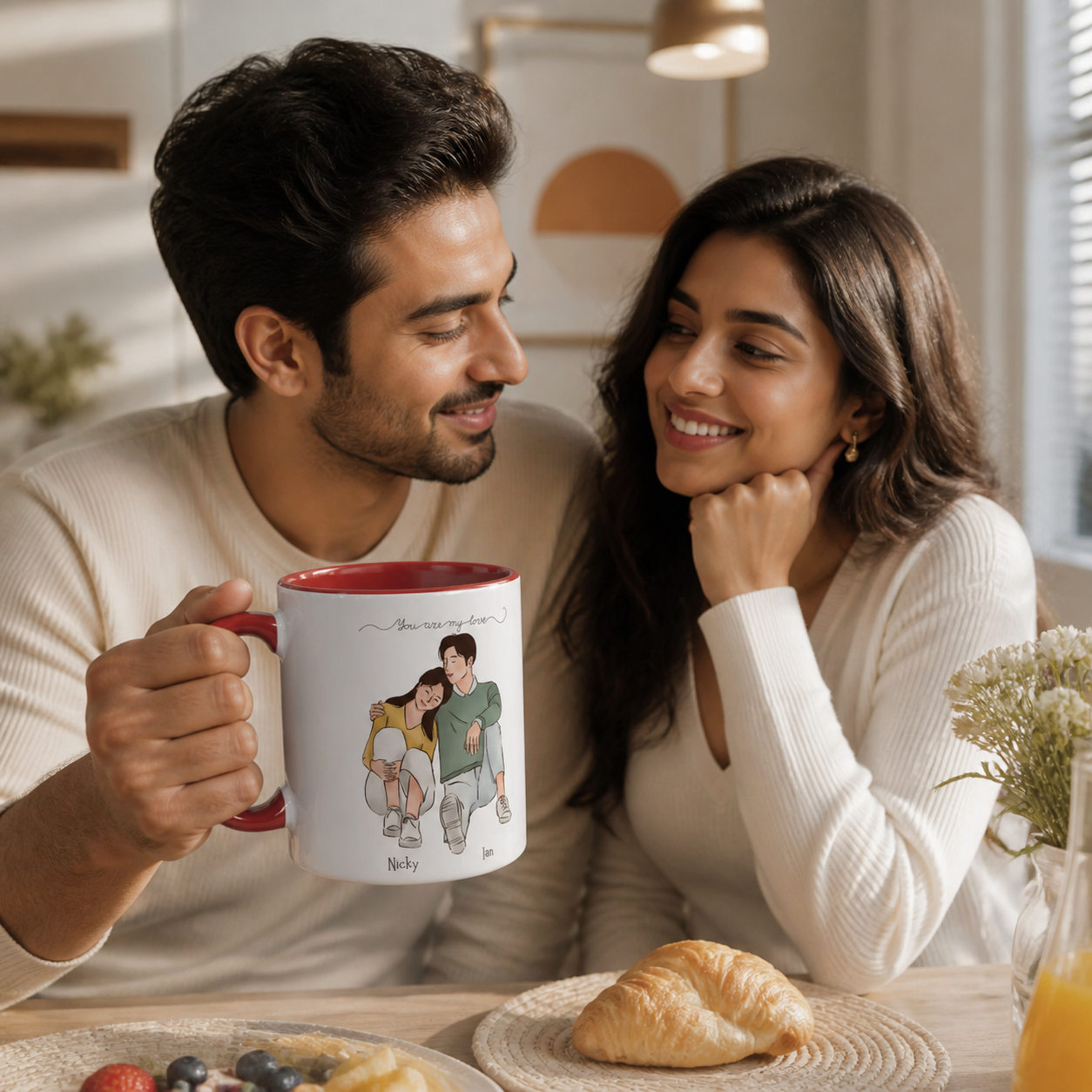 Young couple sharing a personalized red-accent You Are My Love mug at breakfast